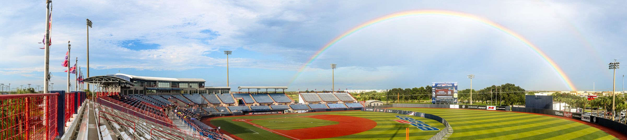 Space Coast Stadium under a rainbow