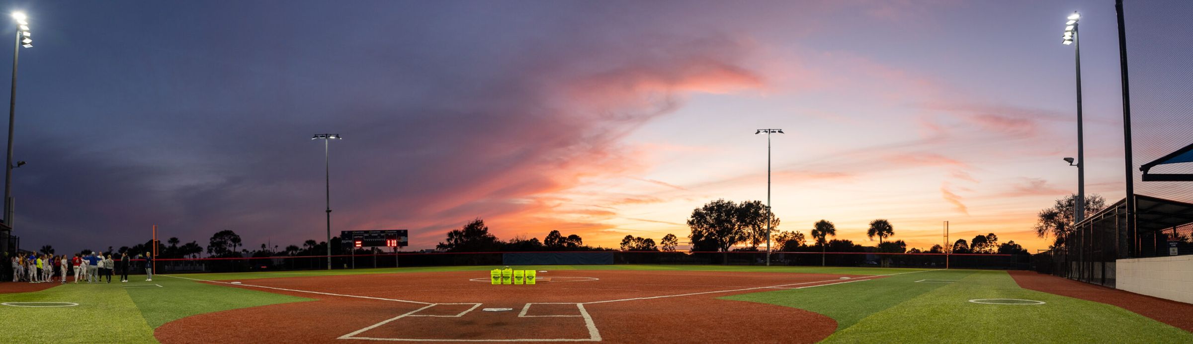 Sunset over a turf field